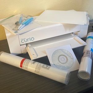 Curio Silhouette Used twice comes with extras